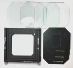Set Used Durst Femoneg L1200 4X5 Negative Carrier With Inserts. Excellent. Fixed Price $550.00.