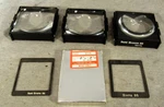 Lot Three Vintage Durst Magnifying Lenses Masks - Two Unbranded (EZS002224). Fixed Price $75.00.