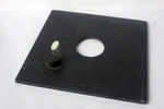 Beseler 4X4 Lens Board W/ Pilot Light Center Drilled 25MM Diameter Working Order. Fixed Price $35.00.