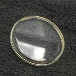 30 Mm Omega Nos Plastic Crystal Glass Golden Ring Signed With Logo. Fixed Price $85.00.