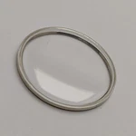 Omega Nos Plastic Crystal Glass Golden Ring Signed With Logo. Fixed Price $50.00.