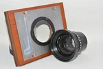 Rodenstock Rodagon 210MM F/5.6 Enlarger Lens With Mount And Board. Fixed Price $60.00.