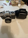 Beseler Topcon Auto 100 Camera W/ 53MM F/2 Lens & Leather Case. Fixed Price $45.00.