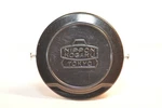 Nikon 52MM Black Lens Cap Nippon Kogaku Chrome Buttons For Tick Mark Type 1959. Fixed Price $85.85.