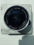Schneider Kreuznach 65MM F8 Super Angulon Lensboard. Fixed Price $470.00.